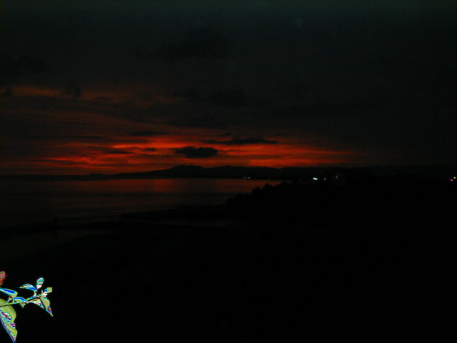 Solnedgang ses fra vores altan